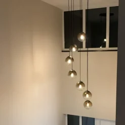 QAZQA Art Deco Hängelampe schwarz mit Goldglas 7-flammig - Pallon