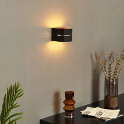 QAZQA Moderne Wandleuchte schwarz mit goldener Innenseite inkl. LED und Touch-Dimmer wiederaufladbar - Joris Groove
